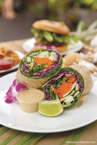 PHOTOS COURTESY FRESH BITE FARM TO BEACH That’s a ‘wrap’ The Buddha wrap ($12) features Kailani Farms organic greens, cabbage, cucumber, green onion, carrots and local roasted macadamia nuts with homemade macadamia nut satay sauce.