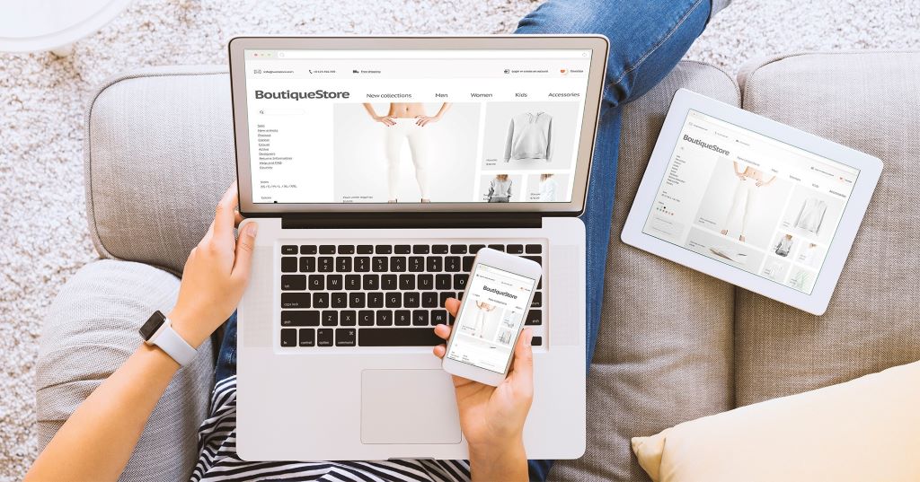 Modern business website layout displayed on desktop and mobile screens