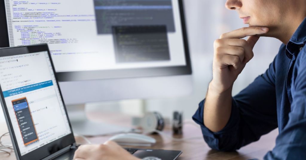 Web designer creating a high-converting website with modern UX elements in 2026
